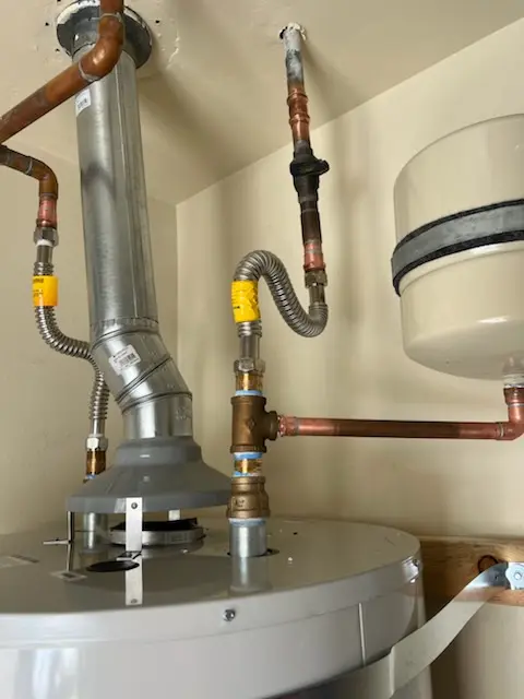 Water heater installation and plumbing repair in DeWitt